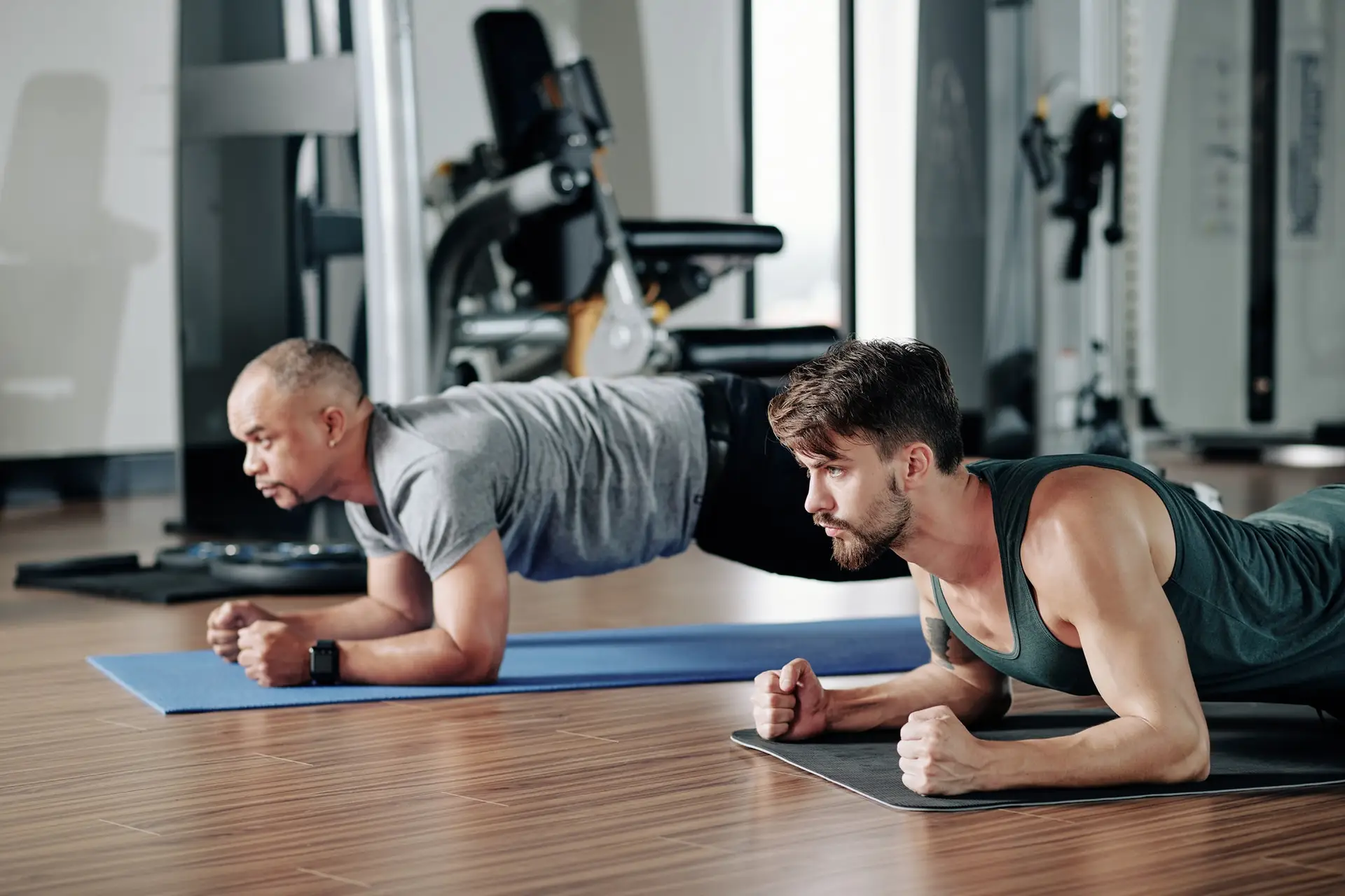 Men standing in plank position